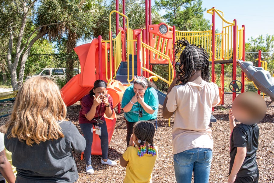 Shelter staff and children 